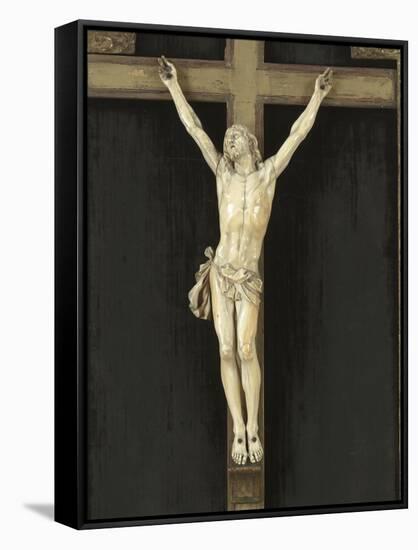 Crucifix en ivoire sur fond de velours, dans un cadre-null-Framed Stretched Canvas