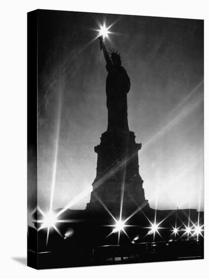 Crystalline Lights Surrounding Statue of Liberty during WWII Blackout-Andreas Feininger-Stretched Canvas