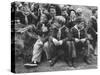 Cub Scouts Sitting around at Camp Out-null-Stretched Canvas