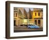 Cuba, Havana, classic car in motion at dusk on Malecon.-Merrill Images-Framed Photographic Print