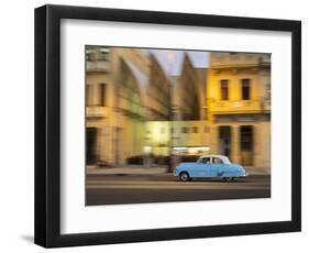 Cuba, Havana, classic car in motion at dusk on Malecon.-Merrill Images-Framed Photographic Print