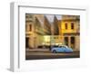 Cuba, Havana, classic car in motion at dusk on Malecon.-Merrill Images-Framed Photographic Print