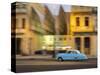 Cuba, Havana, classic car in motion at dusk on Malecon.-Merrill Images-Stretched Canvas