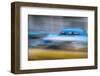 Cuba, Havana. Classic cars speed by in a blur along the streets of the city.-Brenda Tharp-Framed Photographic Print