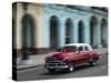 Cuba, Havana, Havana Vieja (UNESCO World Heritage Site), classic car in motion.-Merrill Images-Stretched Canvas