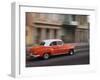 Cuba, Havana, Havana Vieja, UNESCO World Heritage Site, classic red car in motion-Merrill Images-Framed Photographic Print