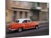 Cuba, Havana, Havana Vieja, UNESCO World Heritage Site, classic red car in motion-Merrill Images-Mounted Photographic Print