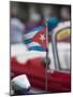 Cuba, Havana, Havana Vieja (UNESCO World Heritage Site), red classic convertible with Cuban flag.-Merrill Images-Mounted Photographic Print