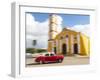 Cuba, Remedios, classic red car in front of Cathedral.-Merrill Images-Framed Photographic Print