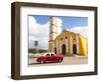 Cuba, Remedios, classic red car in front of Cathedral.-Merrill Images-Framed Photographic Print