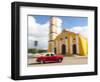 Cuba, Remedios, classic red car in front of Cathedral.-Merrill Images-Framed Photographic Print