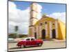 Cuba, Remedios, classic red car in front of Cathedral.-Merrill Images-Mounted Photographic Print