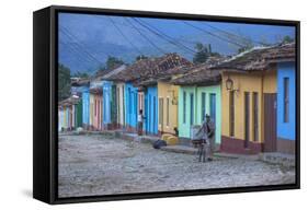 Cuba, Trinidad, a Man Selling Sandwiches Up a Colourful Street in Historical Center-Jane Sweeney-Framed Stretched Canvas