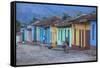 Cuba, Trinidad, a Man Selling Sandwiches Up a Colourful Street in Historical Center-Jane Sweeney-Framed Stretched Canvas