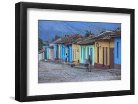 Cuba, Trinidad, a Man Selling Sandwiches Up a Colourful Street in Historical Center-Jane Sweeney-Framed Photographic Print