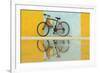 Cuba, Trinidad. Bicycle and reflection against yellow and blue walls.-Brenda Tharp-Framed Photographic Print