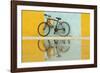 Cuba, Trinidad. Bicycle and reflection against yellow and blue walls.-Brenda Tharp-Framed Photographic Print