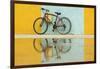 Cuba, Trinidad. Bicycle and reflection against yellow and blue walls.-Brenda Tharp-Framed Photographic Print