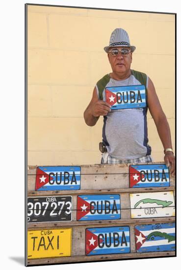 Cuba, Trinidad, Man Selling Cuban Car Number Plates-Jane Sweeney-Mounted Photographic Print