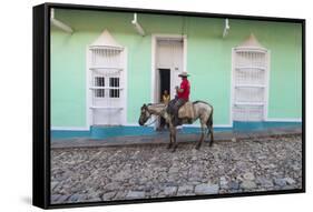 Cuba, Trinidad, Milkman on Horseback Delivers Bottles of Milk to House-Jane Sweeney-Framed Stretched Canvas