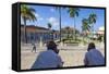 Cuba, Trinidad, Two Security Guards Look across Plaza Mayor-Jane Sweeney-Framed Stretched Canvas
