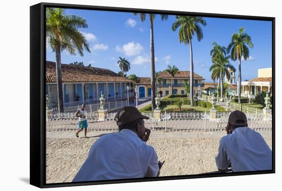 Cuba, Trinidad, Two Security Guards Look across Plaza Mayor-Jane Sweeney-Framed Stretched Canvas