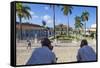 Cuba, Trinidad, Two Security Guards Look across Plaza Mayor-Jane Sweeney-Framed Stretched Canvas