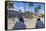 Cuba, Trinidad, Two Security Guards Look across Plaza Mayor-Jane Sweeney-Framed Stretched Canvas