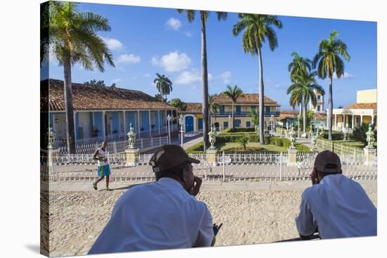 Cuba, Trinidad, Two Security Guards Look across Plaza Mayor-Jane Sweeney-Stretched Canvas