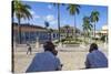 Cuba, Trinidad, Two Security Guards Look across Plaza Mayor-Jane Sweeney-Stretched Canvas