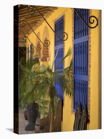 Cuba, Trinidad, UNESCO, blue shutters in courtyard of Casa Particular, Spanish style colonial home-Merrill Images-Stretched Canvas