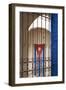 Cuba, Vinales, Cuban flag in courtyard and wrought iron gate.-Merrill Images-Framed Photographic Print