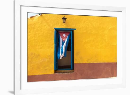 Cuban Flag Hanging on a Door in Trinidad, Cuba-Sabino Parente-Framed Photographic Print