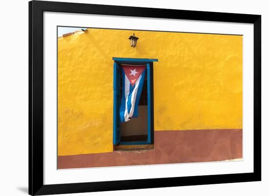 Cuban Flag Hanging on a Door in Trinidad, Cuba-Sabino Parente-Framed Photographic Print