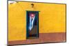 Cuban Flag Hanging on a Door in Trinidad, Cuba-Sabino Parente-Mounted Photographic Print