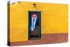 Cuban Flag Hanging on a Door in Trinidad, Cuba-Sabino Parente-Stretched Canvas