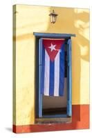 Cuban Flag in doorway, Trinidad, Sancti Spiritus, Cuba-Ed Hasler-Stretched Canvas