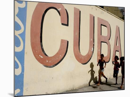 Cuban Girls Run in a Street in Havana, Cuba, Thursday, August 10, 2006-Javier Galeano-Mounted Photographic Print