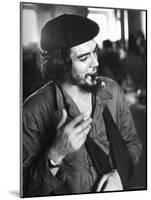 Cuban Rebel Ernesto "Che" Guevara, Left Arm in a Sling, Talking with Unseen Person-Joe Scherschel-Mounted Premium Photographic Print