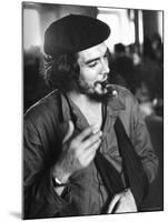 Cuban Rebel Ernesto "Che" Guevara, Left Arm in a Sling, Talking with Unseen Person-Joe Scherschel-Mounted Premium Photographic Print