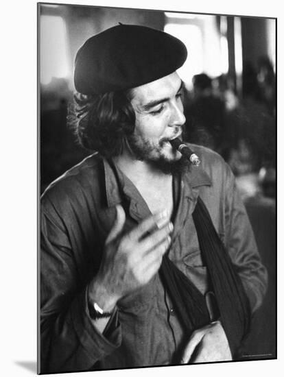 Cuban Rebel Ernesto "Che" Guevara, Left Arm in a Sling, Talking with Unseen Person-Joe Scherschel-Mounted Premium Photographic Print