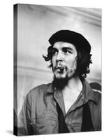 Cuban Rebel Ernesto "Che" Guevara with Lit Cigar Clenched Between Teeth and Left Arm in a Sling-Joe Scherschel-Stretched Canvas