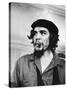 Cuban Rebel Ernesto "Che" Guevara with Lit Cigar Clenched Between Teeth and Left Arm in a Sling-Joe Scherschel-Stretched Canvas