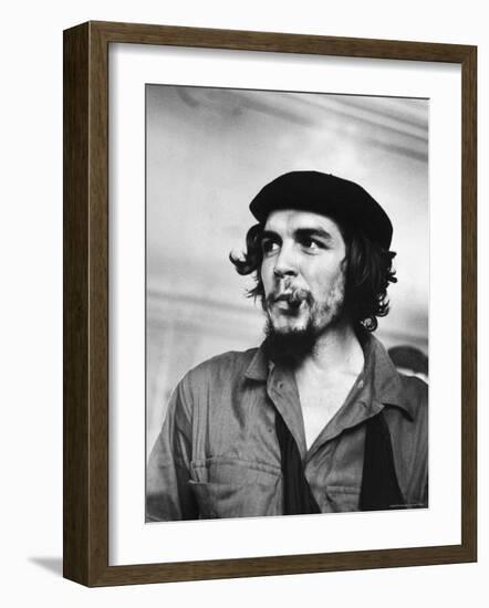 Cuban Rebel Ernesto "Che" Guevara with Lit Cigar Clenched Between Teeth and Left Arm in a Sling-Joe Scherschel-Framed Premium Photographic Print