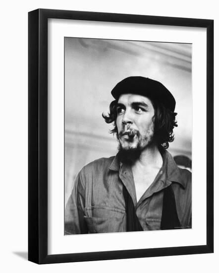 Cuban Rebel Ernesto "Che" Guevara with Lit Cigar Clenched Between Teeth and Left Arm in a Sling-Joe Scherschel-Framed Premium Photographic Print