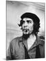 Cuban Rebel Ernesto "Che" Guevara with Lit Cigar Clenched Between Teeth and Left Arm in a Sling-Joe Scherschel-Mounted Premium Photographic Print