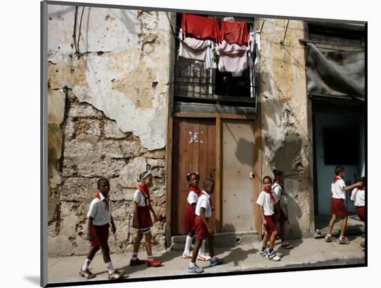 Cuban Students Walk Along a Street in Old Havana, Cuba, Monday, October 9, 2006-Javier Galeano-Mounted Photographic Print