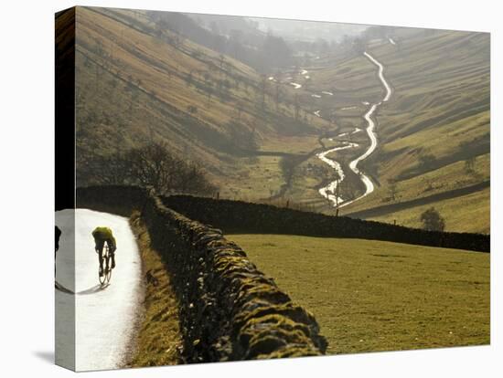 Cumbria, Lake District, Cycling Through Buttermere in the Lake District, England-Paul Harris-Stretched Canvas