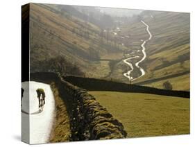 Cumbria, Lake District, Cycling Through Buttermere in the Lake District, England-Paul Harris-Stretched Canvas