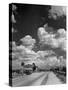 Cumulus Clouds Billowing over Texaco Gas Station along a Stretch of Highway US 66-Andreas Feininger-Stretched Canvas